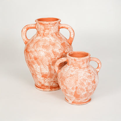 White background image of peach ceramic vase set for elegant interior decor styling with artistic matte finish.