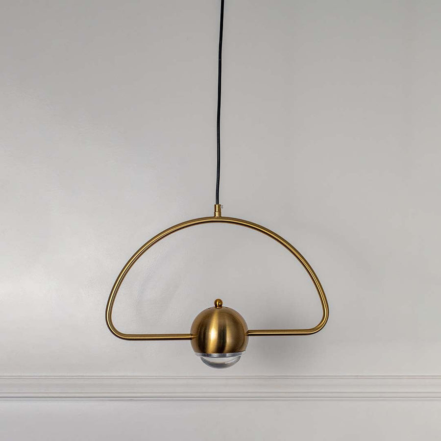 Elegant golden arch frame pendant light with dome shaped glass diffuser modern ceiling lamp for bedroom and living room decor.