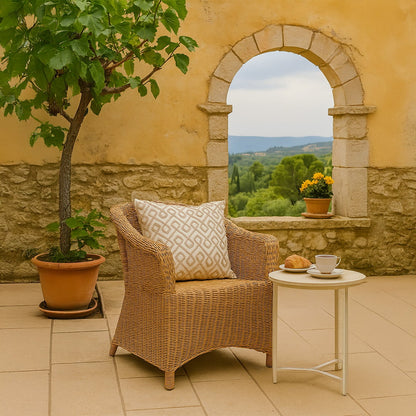 Geometric embroidered cushion adding a modern textured accent to contemporary home decor styling.