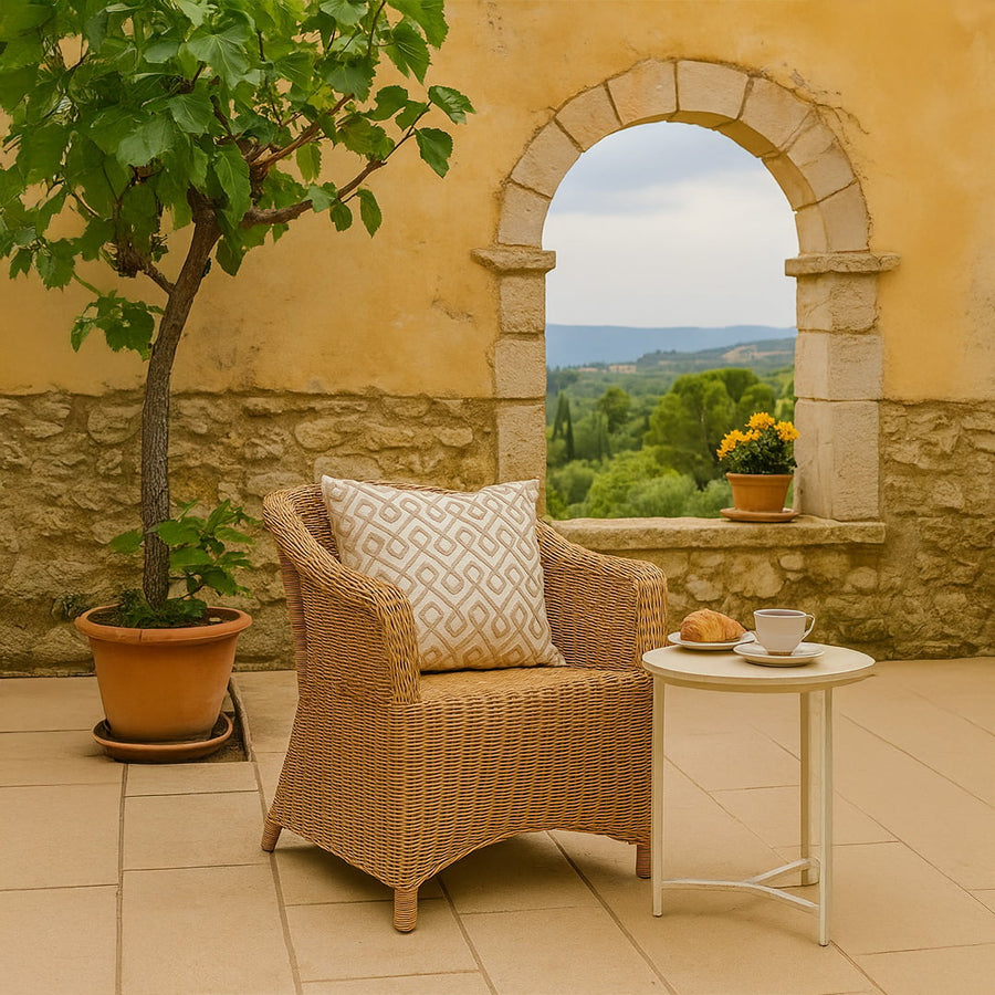 Geometric embroidered cushion adding a modern textured accent to contemporary home decor styling.