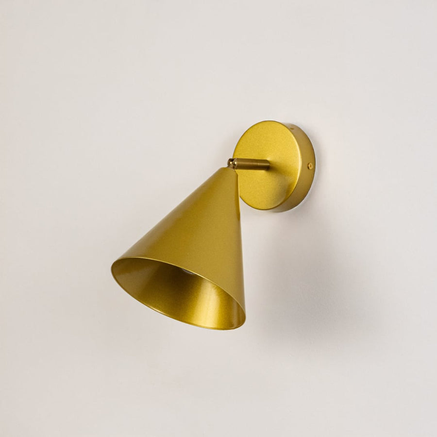 Gold conical wall sconce displayed switched off on a clean white background showing its smooth modern metal design ideal for elegant interior decor styling.