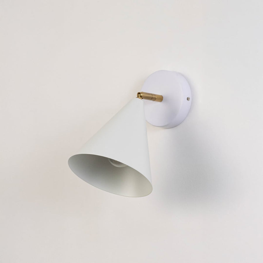 White conical wall sconce shown switched off on a clean white background highlighting its smooth modern metal design ideal for elegant interior decor.