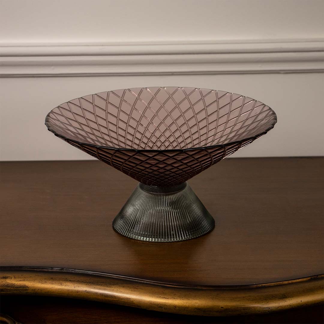 Brown glass centerpiece bowl featuring diamond-cut detailing and ribbed conical base highlighted on clean white backdrop.
