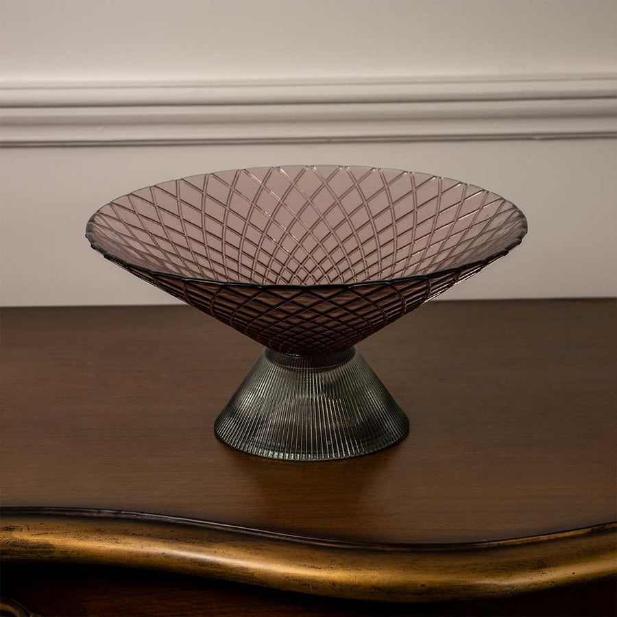 Brown glass centerpiece bowl featuring diamond-cut detailing and ribbed conical base highlighted on clean white backdrop.