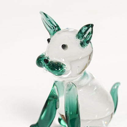 crystal glass cute lying cat blue closeup