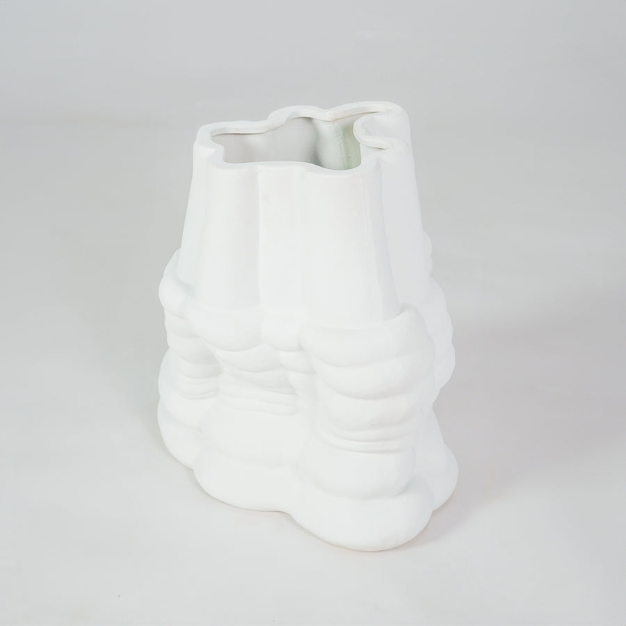 White textured ceramic decorative vase on white background for stylish contemporary home decor styling.