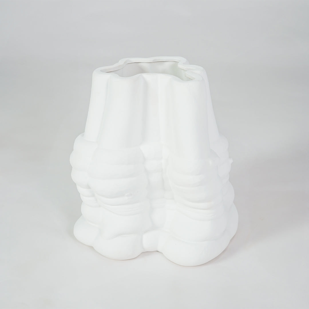 White textured ceramic vase on white background for elegant modern tabletop home decor styling.