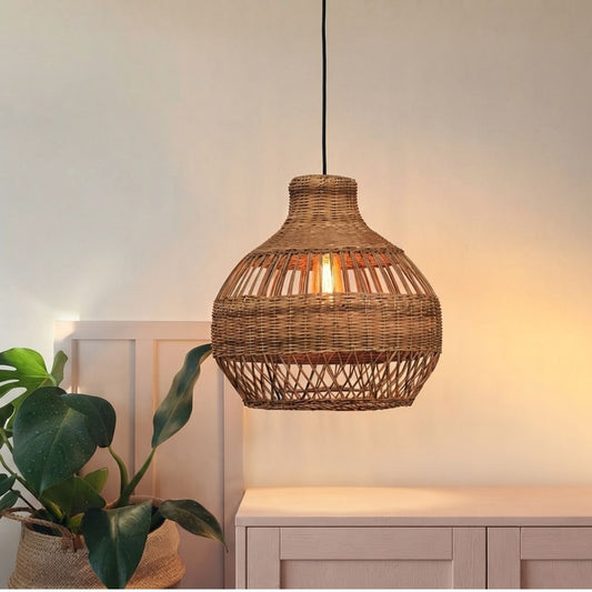 Lifestyle image of beige cupola rattan hanging lamp for elegant living room decor styling and modern coastal home lighting.