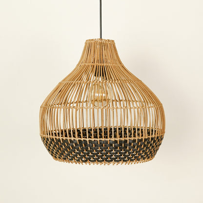 Natural and black rattan pendant light with woven design for stylish dining room ceiling placement.