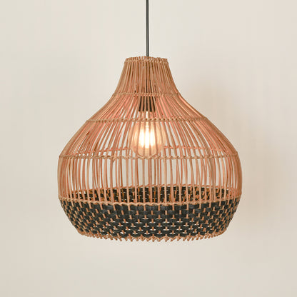 Natural and black rattan pendant light with warm glow enhancing modern dining room ceiling decor.