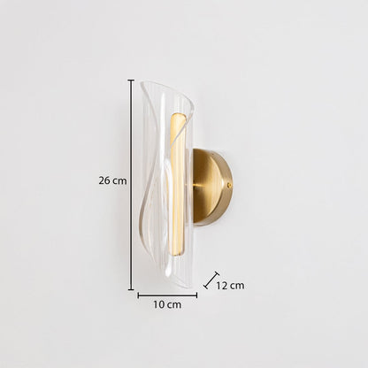 Gold wall light with sculpted clear glass shade shown with 26 cm height and 10 cm width for accurate sizing.