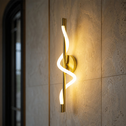 Modern gold metal LED wall light lifestyle image with artistic glowing design for elegant luxury interior decor.