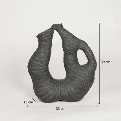 Dimension image of a textured charcoal black ceramic arch sculpture vase with open cutouts showing 39 cm height and 33 cm width.