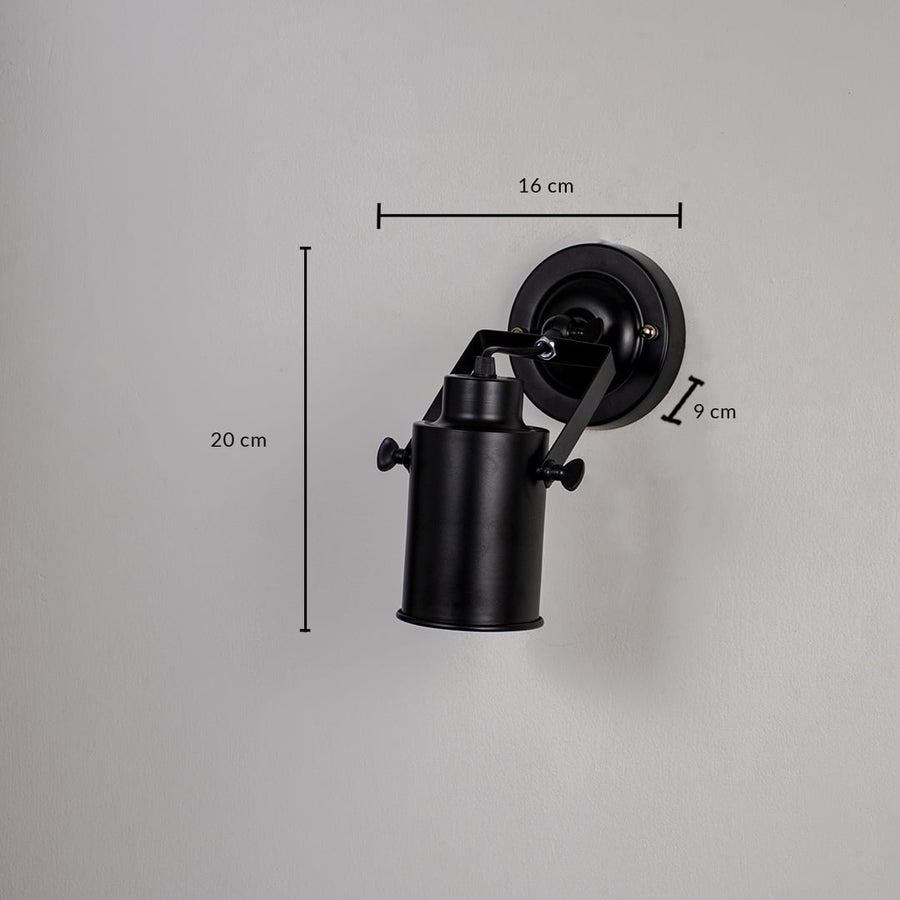 Black metal wall light with 30 cm height 35 cm width and 7 cm depth for modern decor styling spaces.