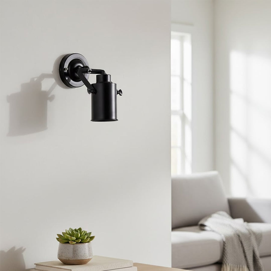 Modern black metal wall light for minimalist bedroom hallway and luxury decor styling spaces.