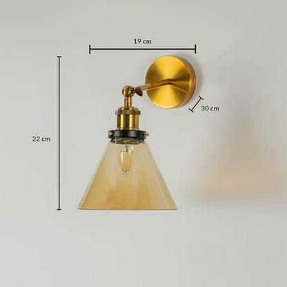 Gold metal glass wall light with 22 cm height 19 cm width and 12 cm depth for modern decor spaces.