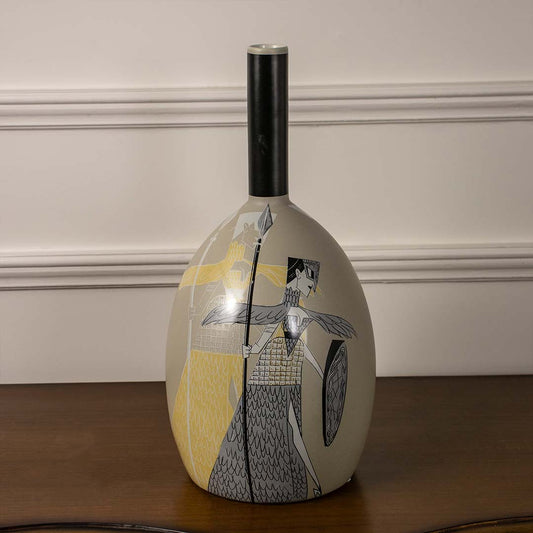 Beige and black ceramic decorative vase with handpainted warrior design placed on white background for home decor.