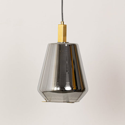 A smoked glass pendant light displayed with the light off on a plain white background showing its angular modern shape and brass top detail.