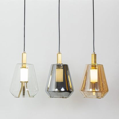 Clear white smoke and amber glass pendant lights with metal accents for elegant modern home decor.