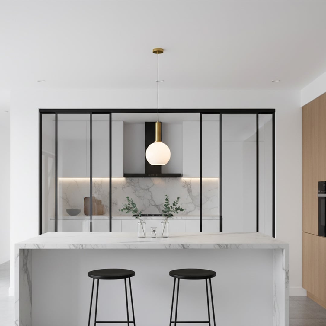 White glass globe pendant light above kitchen island adding modern elegance and warm ambient lighting to interiors.