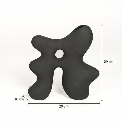 Dark grey ceramic abstract vase 29 cm height 29 cm width ideal for shelf and tabletop decor placement.