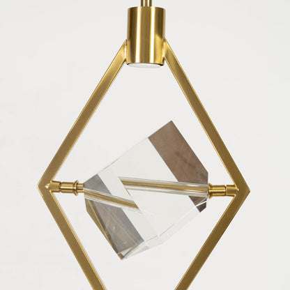 Closeup of pendant light with golden diamond frame and crystal centerpiece elegant ceiling lamp design.
