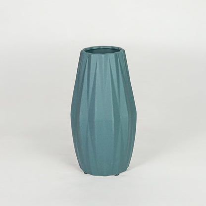 Modern green decorative flower vase isolated clean background stylish ceramic vase for home decor accent.