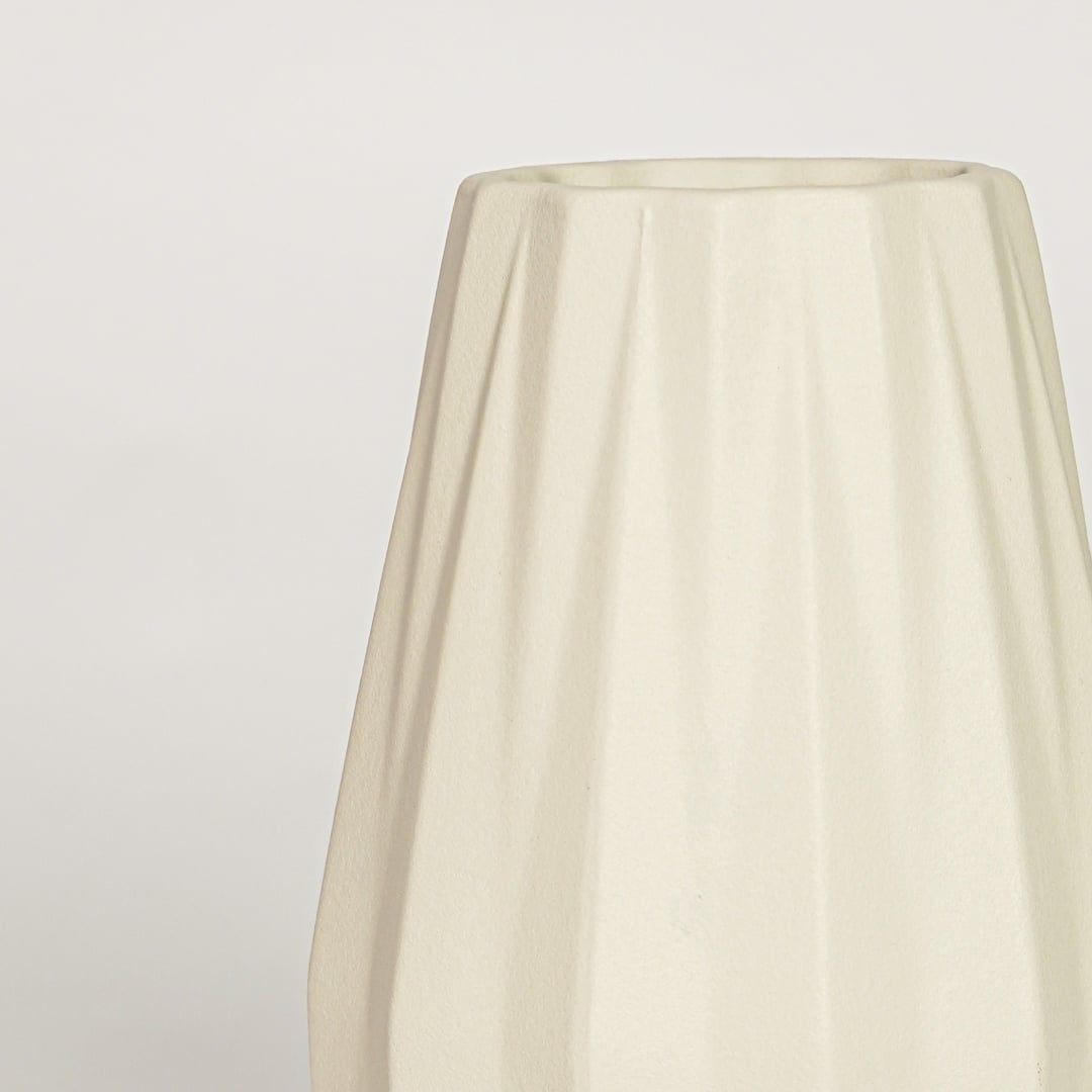 Beige ceramic decorative vase with vertical fluted texture perfect for elegant dried floral display and contemporary interior decor.