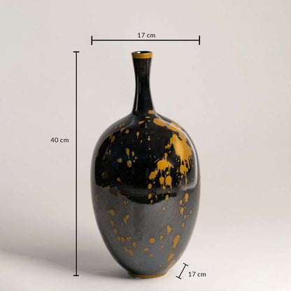 Decorative black glass vase with gold speckle finish showing 30 cm height and 12 cm width for tabletop and console Decor placement.