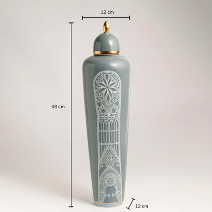 Ceramic jar in green with golden lid and white detailing shown with 48 cm height and 12 cm width dimensions.