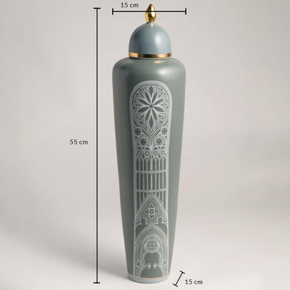 Green ceramic jar with golden lid and white design shown with 55 cm height and 15 cm width for decor placement.