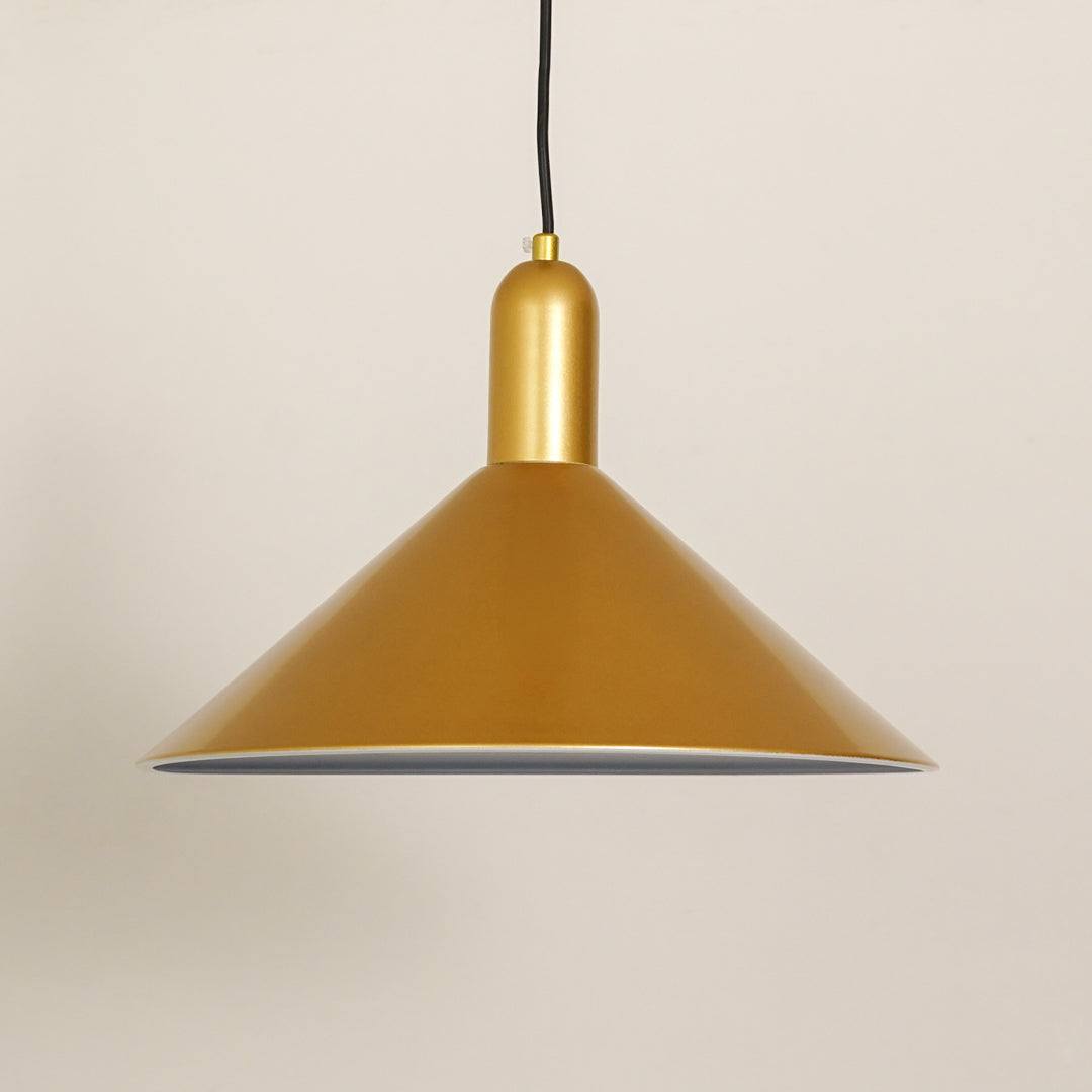 Matte gold metal pendant light with smooth finish illuminating elegant modern spaces.