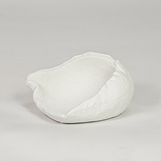 White ceramic decorative bowl with textured finish modern centerpiece bowl for table console living room decor styling.