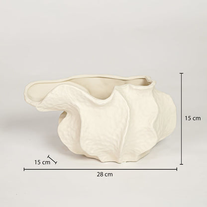 White ceramic abstract decorative bowl measuring 15 cm height 28 cm width and 15 cm depth perfect for tabletop decor placement.