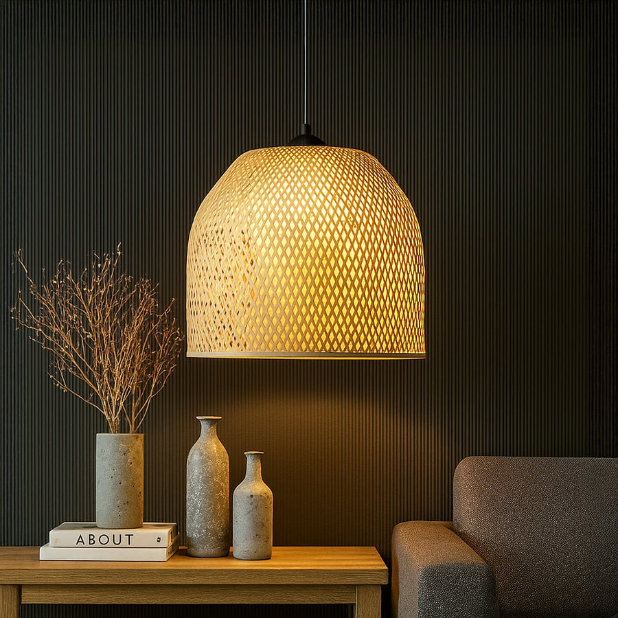 Black woven rattan pendant light styled in a modern living space adding cozy ambient lighting and rustic charm.