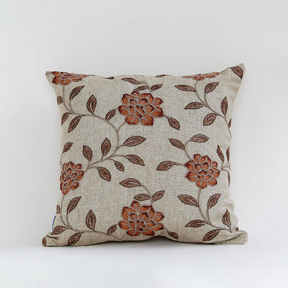 Beige cushion cover with brown floral print on textured fabric designed for sofa chair and bed home decor styling.