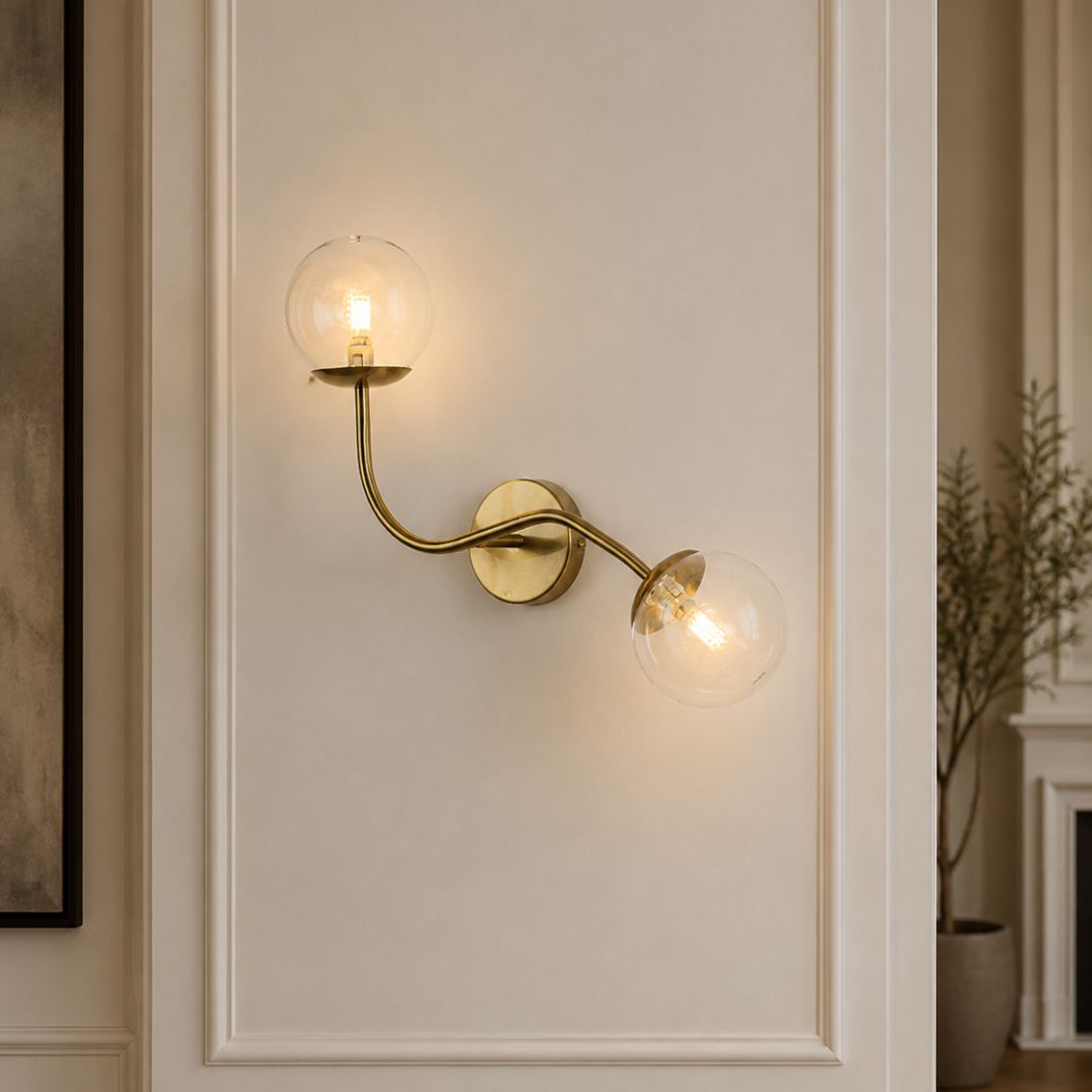 Lifestyle image of double glass ball wall lamp for elegant hallway decor styling and modern home lighting.