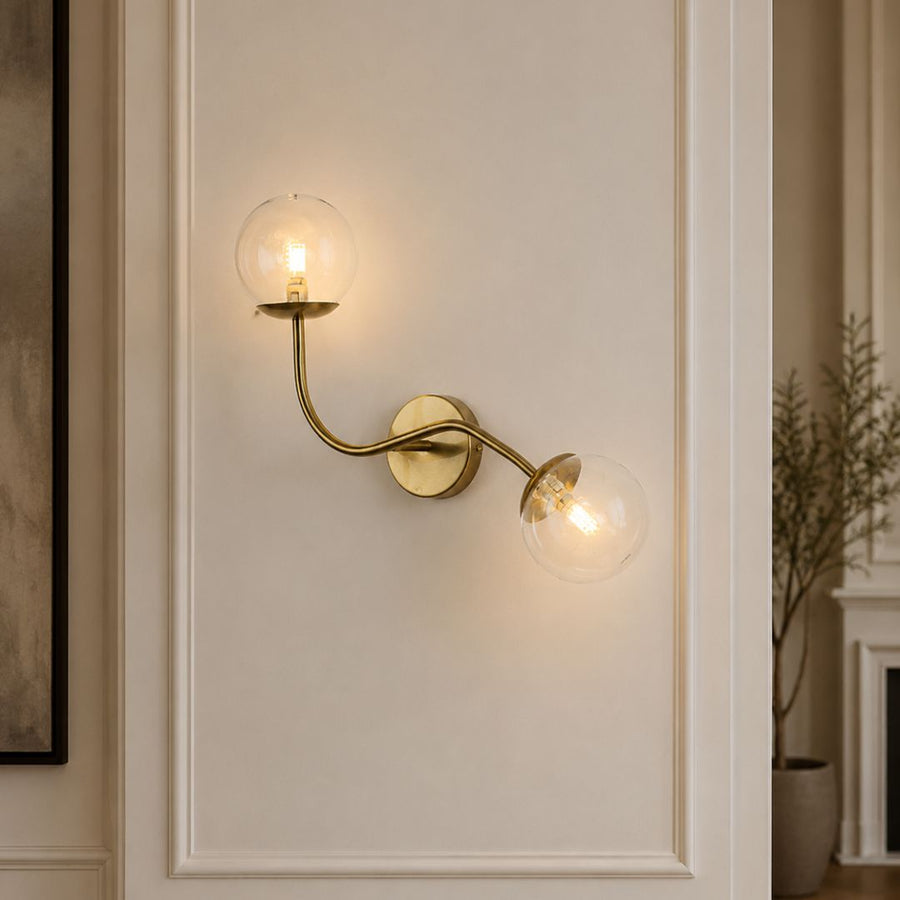 Lifestyle image of double glass ball wall lamp for elegant hallway decor styling and modern home lighting.
