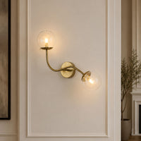 Lifestyle image of double glass ball wall lamp for elegant hallway decor styling and modern home lighting.