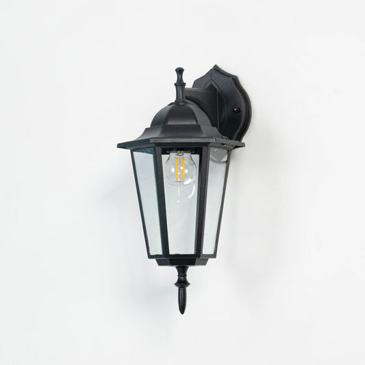 Unlit outdoor wall light in matte black finish displayed on white background highlighting smooth frame and crisp structure.
