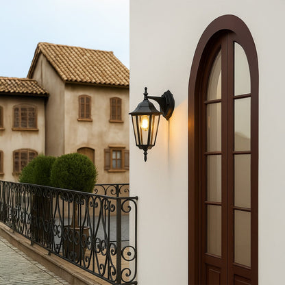 Modern outdoor wall lantern enhancing exterior walls with sleek black frame and clear glass panels for elegant night lighting.
