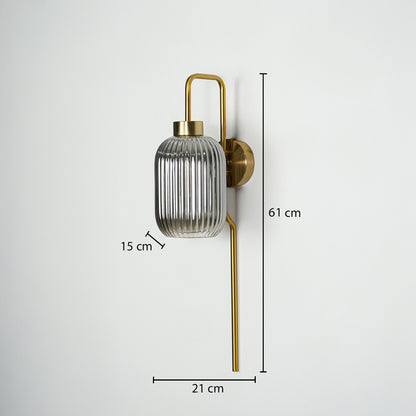 Gold metal wall light sized 61 cm height 21 cm width and 15 cm depth ideal for modern interior wall decor installation.
