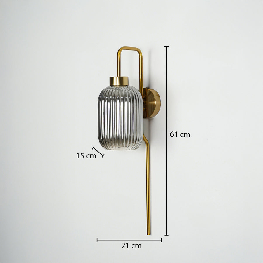 Gold metal wall light sized 61 cm height 21 cm width and 15 cm depth ideal for modern interior wall decor installation.