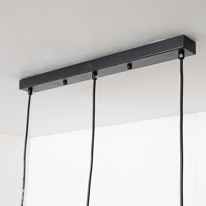 Black metal linear ceiling canopy with hanging cords highlighting premium finish and craftsmanship.