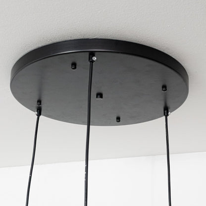 Black metal round ceiling canopy with hanging cords highlighting premium finish and craftsmanship.