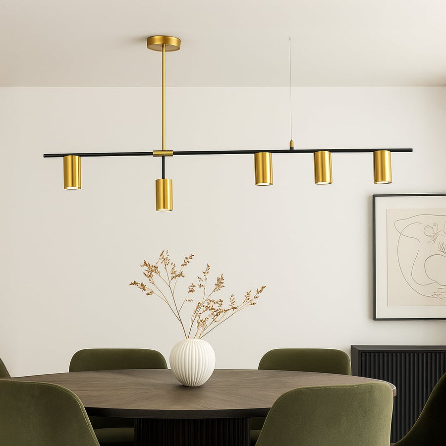 Modern gold linear chandelier enhancing dining and living areas with sleek black rod design and refined ambient lighting style.