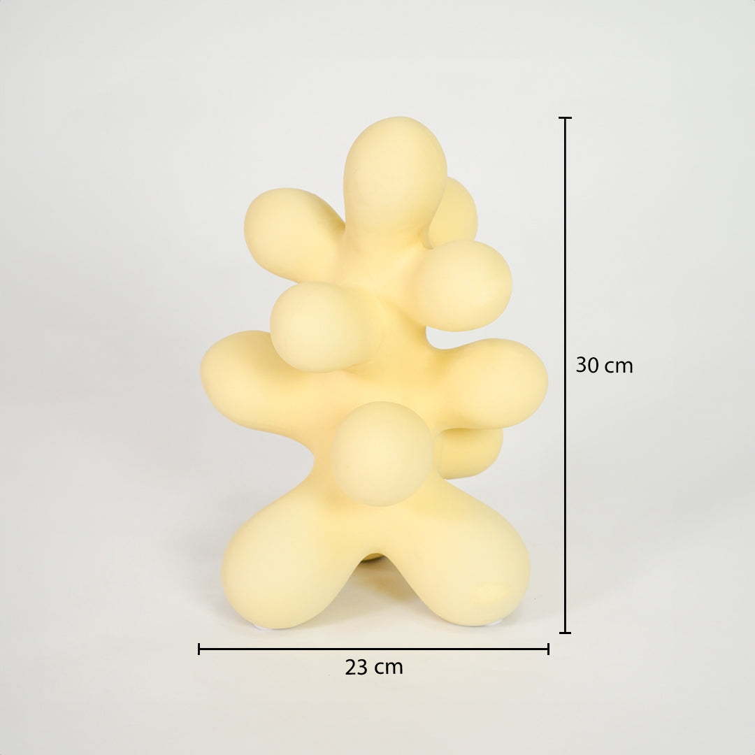 Yellow abstract ceramic sculpture dimension image with 20 cm height and 23 cm width for table decor.