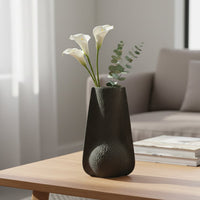 Black textured ceramic floor vase styled in living room corner modern decorative ceramic accent for console floor styling home.