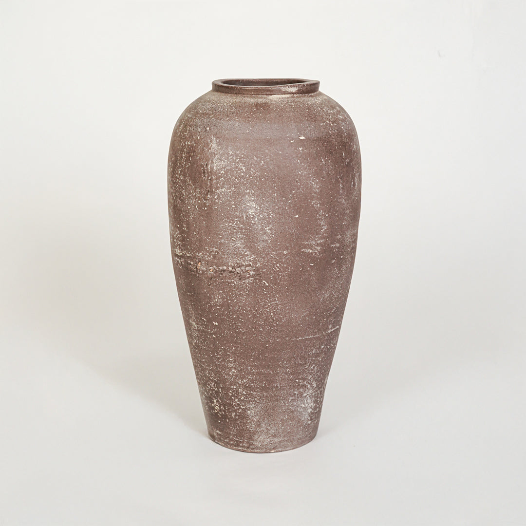 White background image of brown ceramic decorative vase for elegant floor placement with rustic matte finish.
