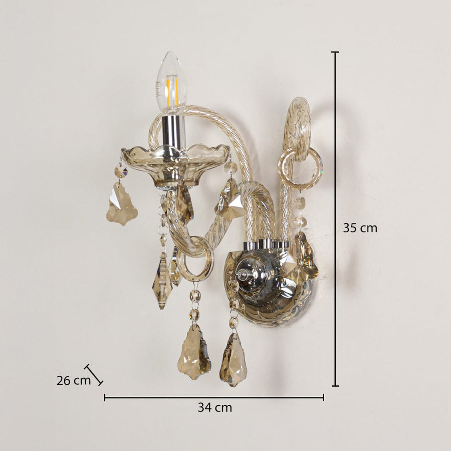Wall light with champagne glass frame and crystal droplets shown with 35 cm height and 34 cm width and 26 cm depth for accurate placement.